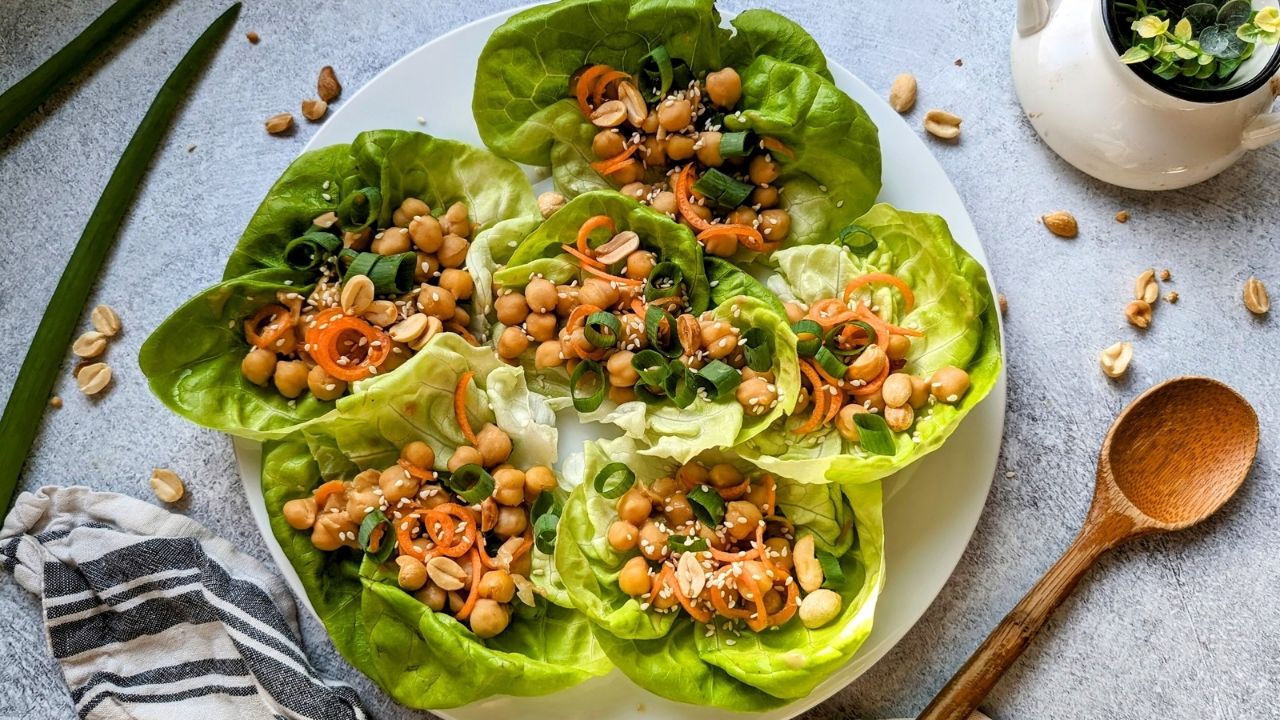 vegan lettuce wraps with garbanzo beans and carrots with green onions in boston lettuce cups vegan p f chang copycat recipe