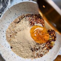 Hot Honey Chili Crisp Recipe (Sweet & Spicy Condiment) - The Herbeevore