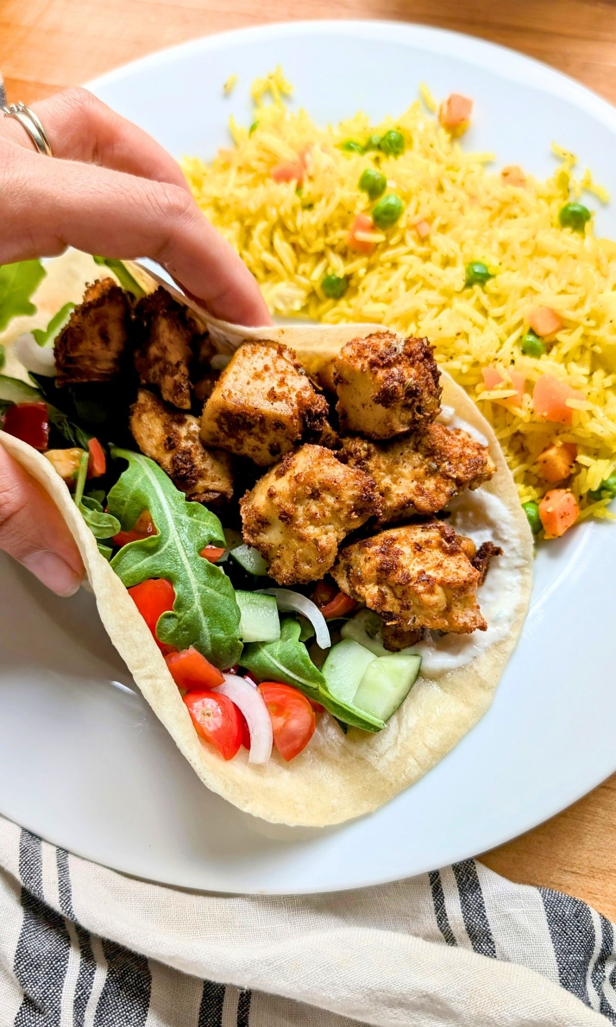 sheet pan shawarma with tofu vegan gluten free tofu wraps healthy plant based vegetarian shawarma wraps sandwiches with middle eastern spices and cucumber tzatziki creamy sauce shawarmas.