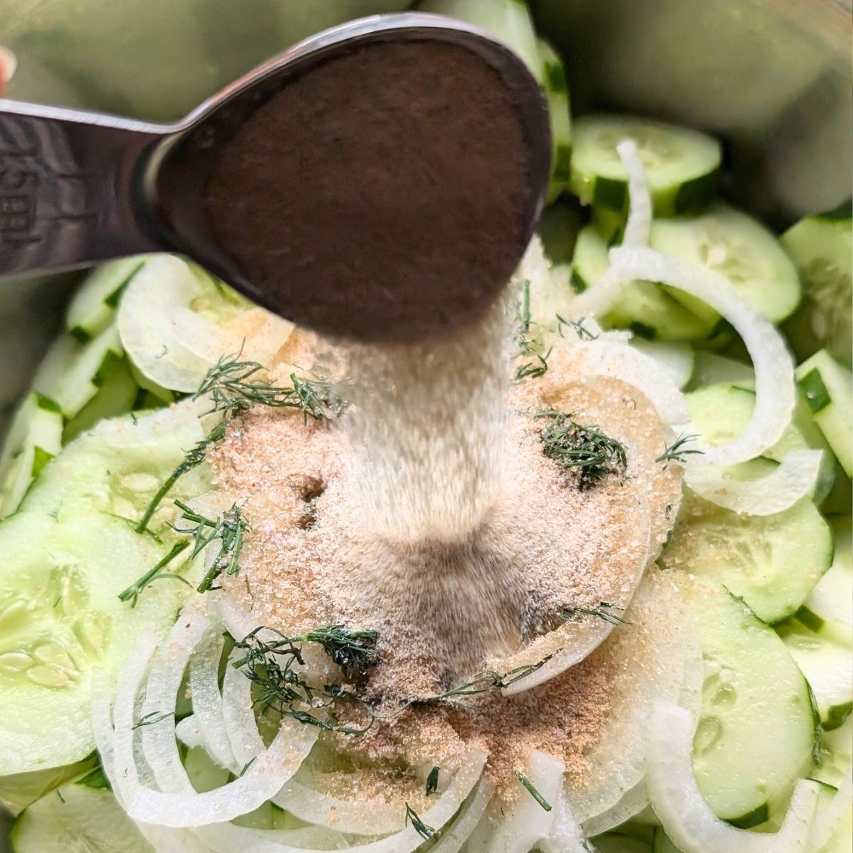 a cucumber and onion salad with onion powder and garlic powder.