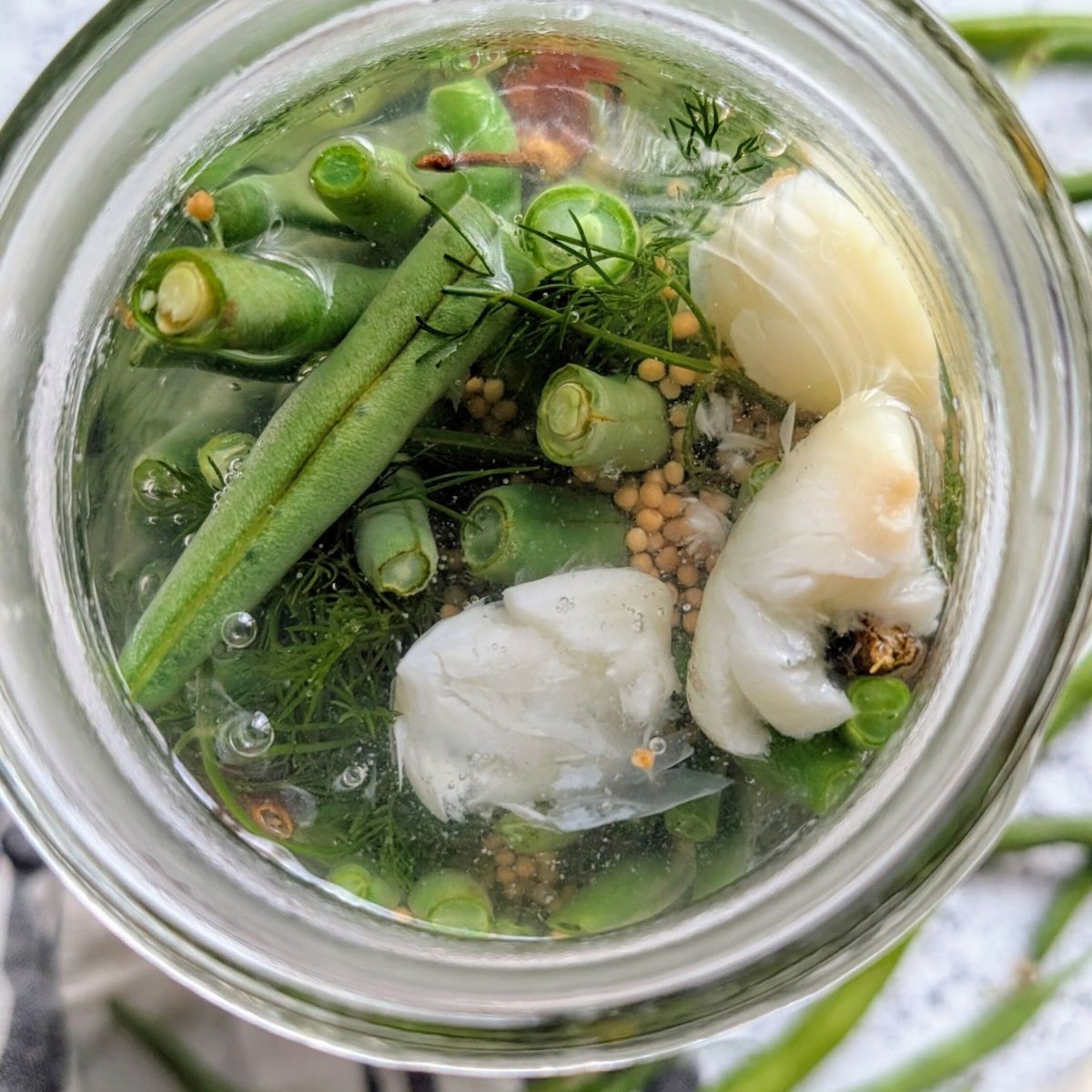 make spicy beans for cocktails caesars and bloody marys add spicy pickled green beans to your drinks