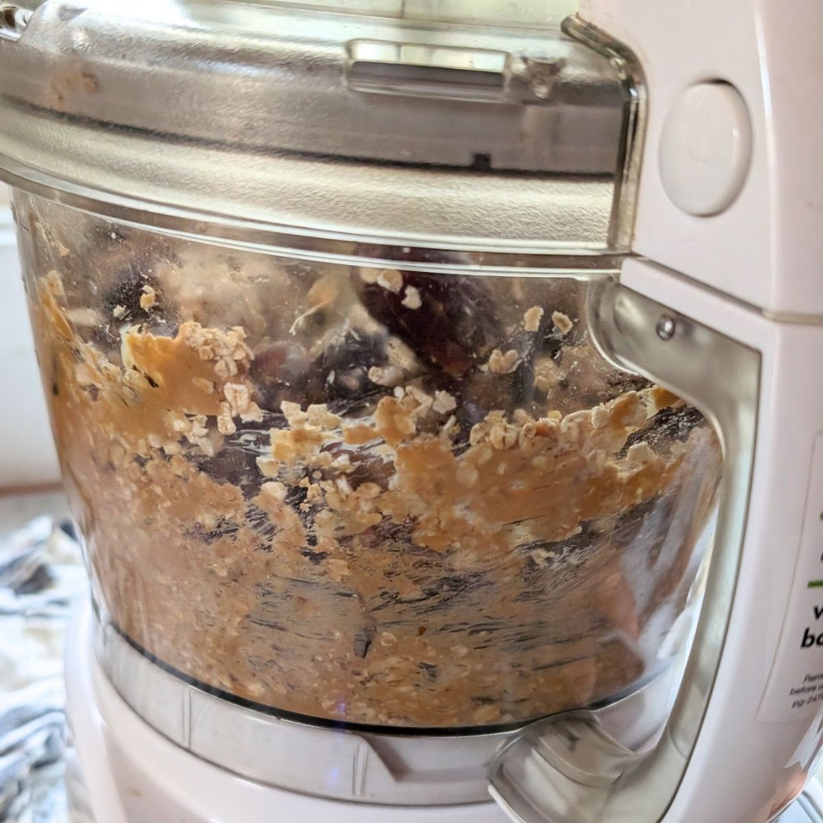 food processor full of oats and chocolate to make a hearty snack.