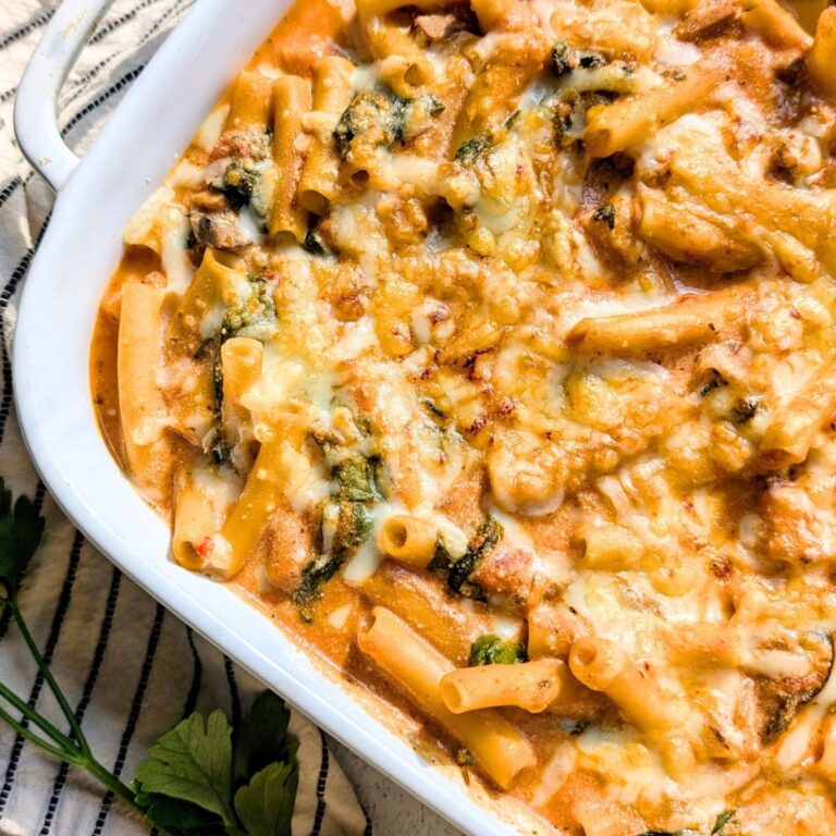 meatless baked ziti recipe with ricotta cheese and spinach baked in a dish.