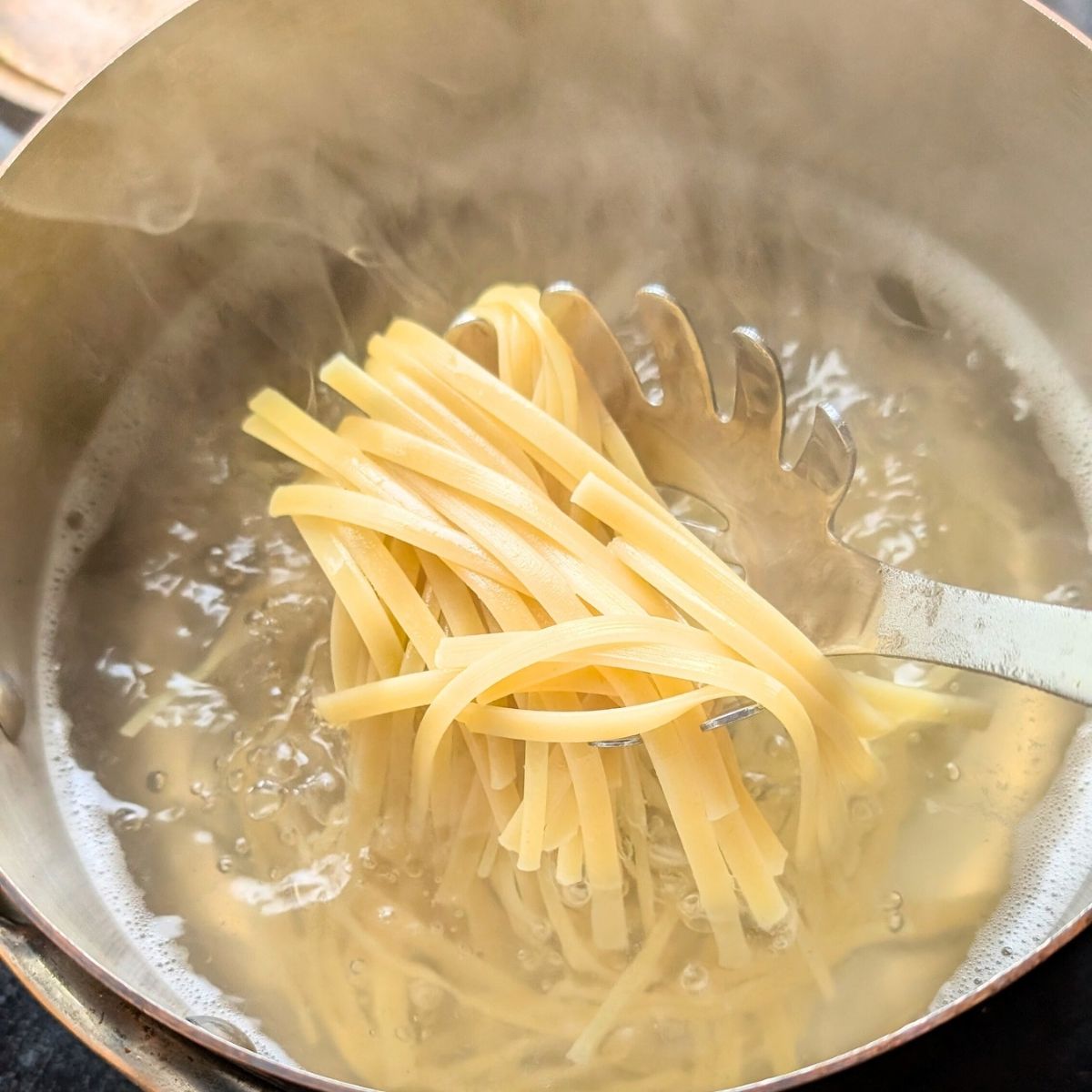 cooked linguine in a pot of boiling water ready for fresh pasta in 20 minutes.