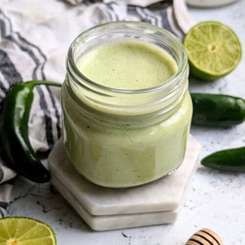 serrano pepper lime salad dressing recipe for gain bowls or tacos in a mason jar.