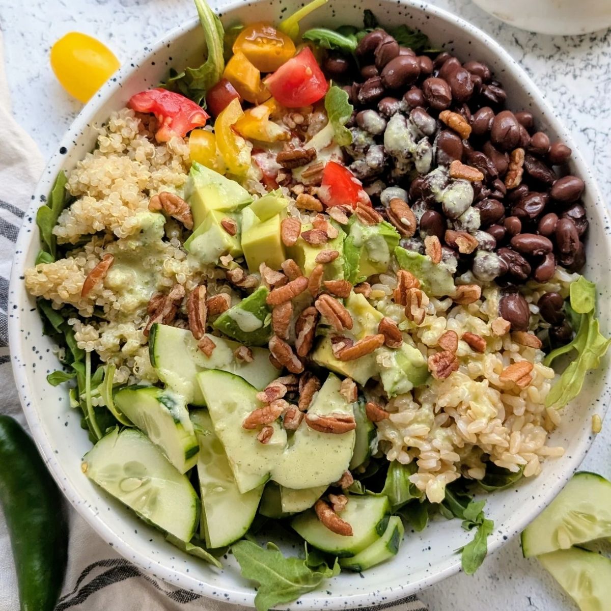 a Southwest rice bowl meal prep salad with jalapeno lime dressing for a hearty meal idea.