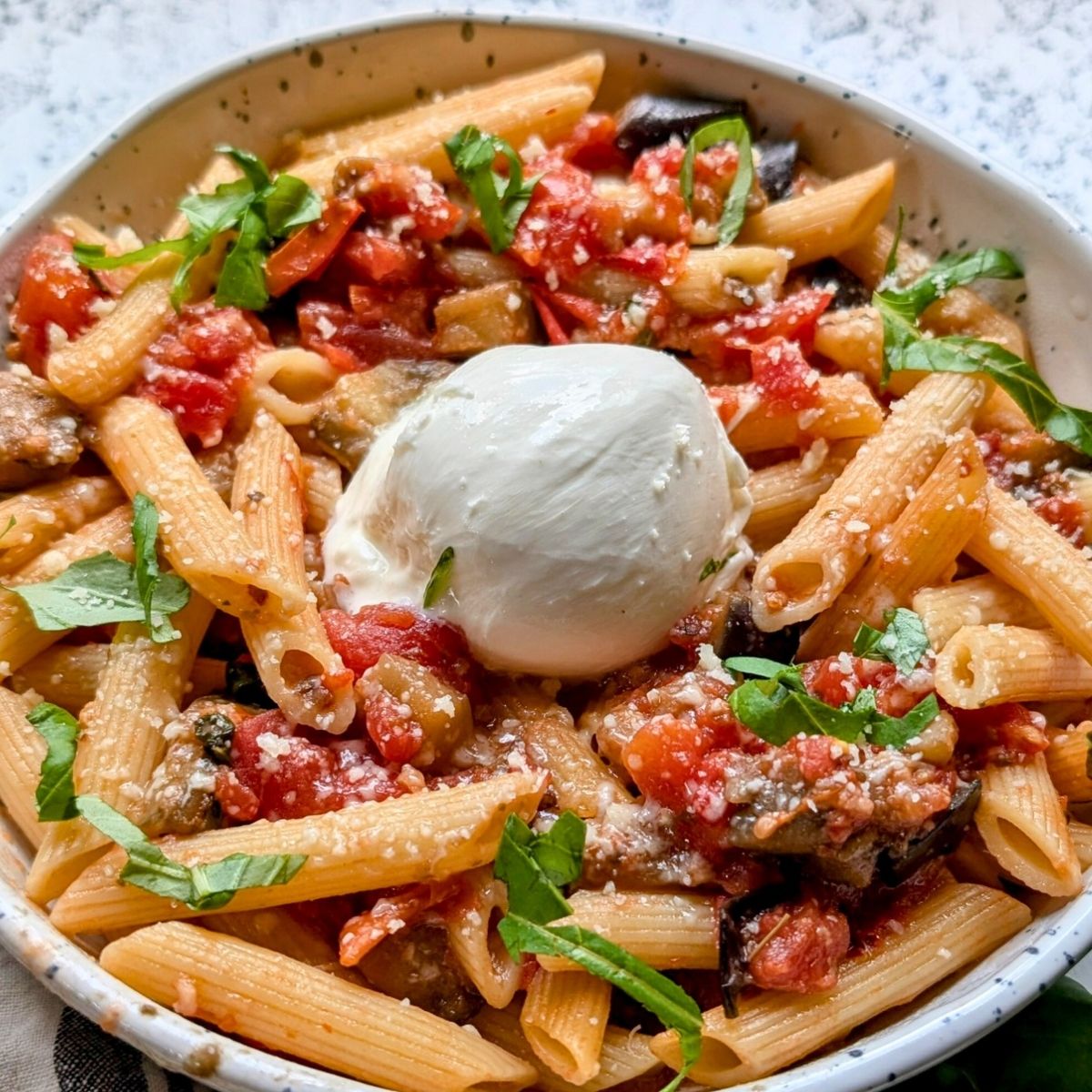 pasta siciliana al forno with burrata cheese and eggplant (all norma) baked in the oven.