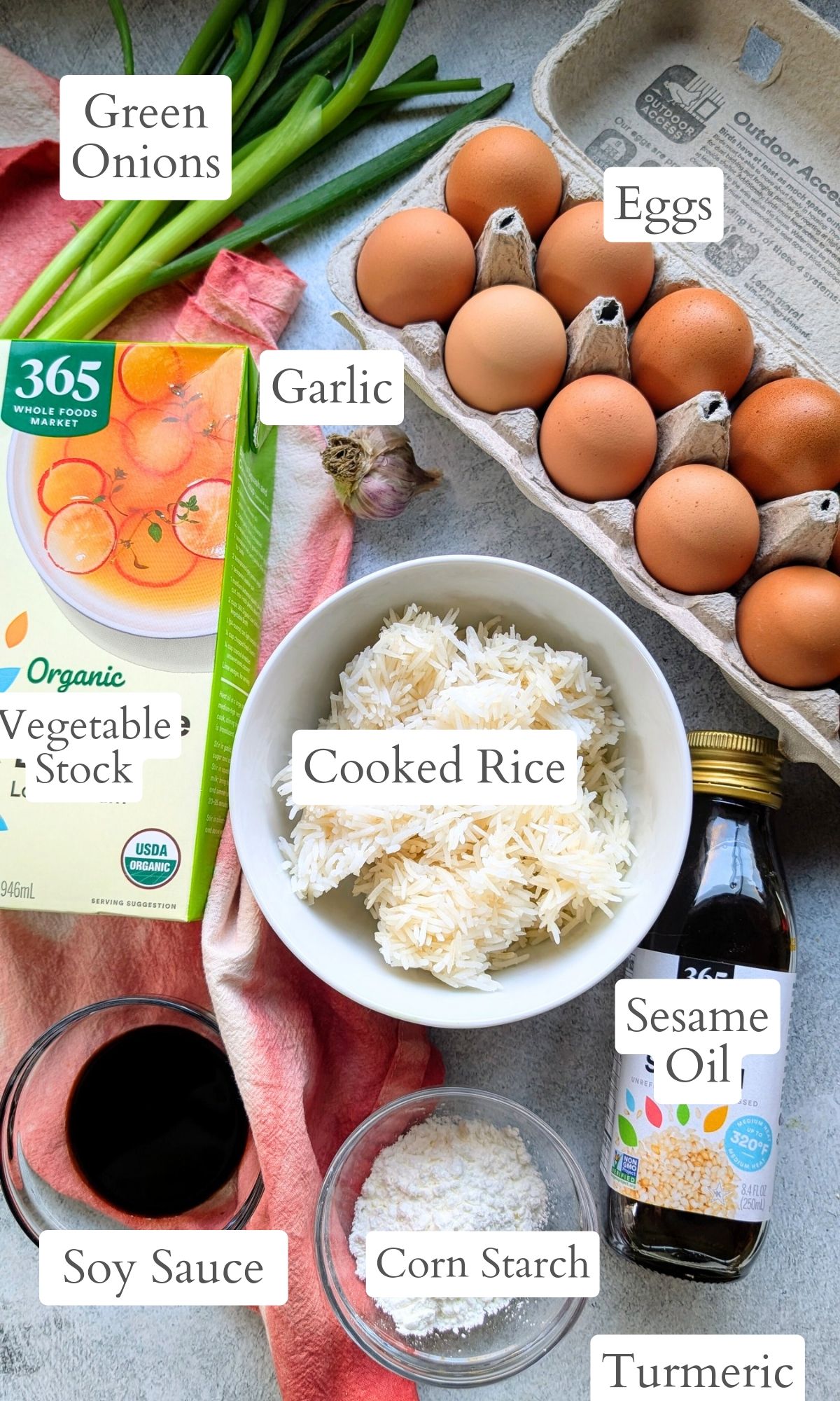 ingredients for egg and rice soup like vegetable stock sesame oil corn starch and soy sauce to make egg drop soup