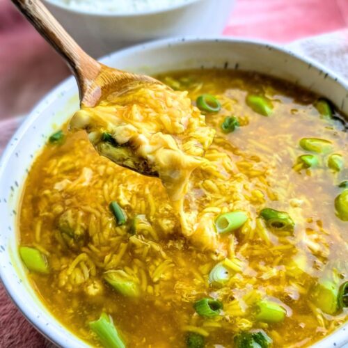 egg drop and rice soup with scallions in a thick and tasty broth