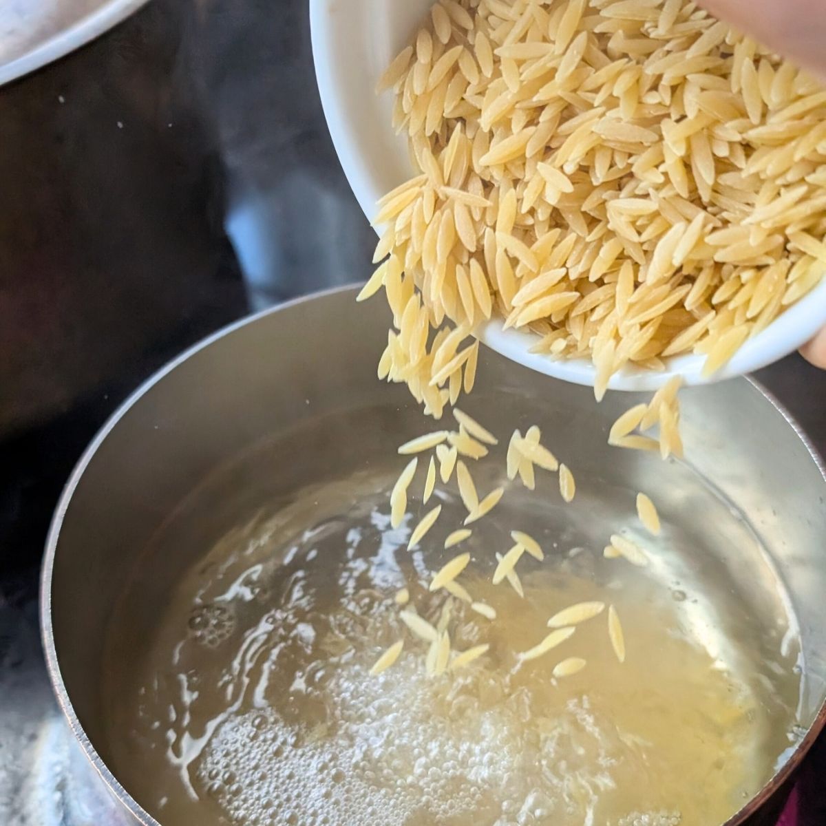 cooked orzo in a pot of boiling water to make pasta salad