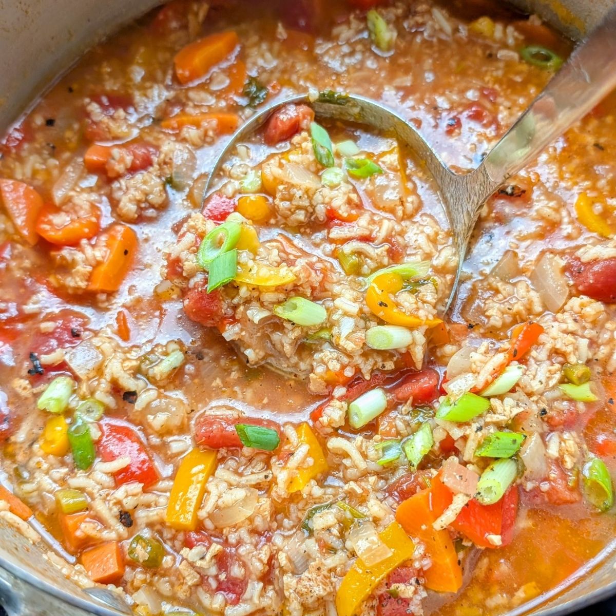 stir in the parsley and green onions to the stuffed pepper soup and serve hot