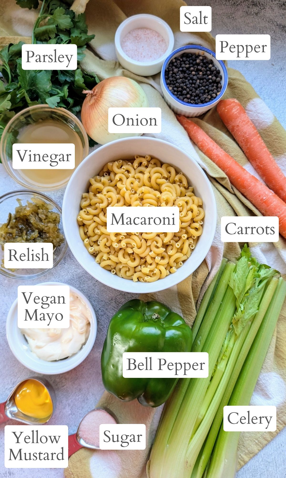 dairy free mac salad ingredients like pasta, carrots, celery, relish, and bell pepper