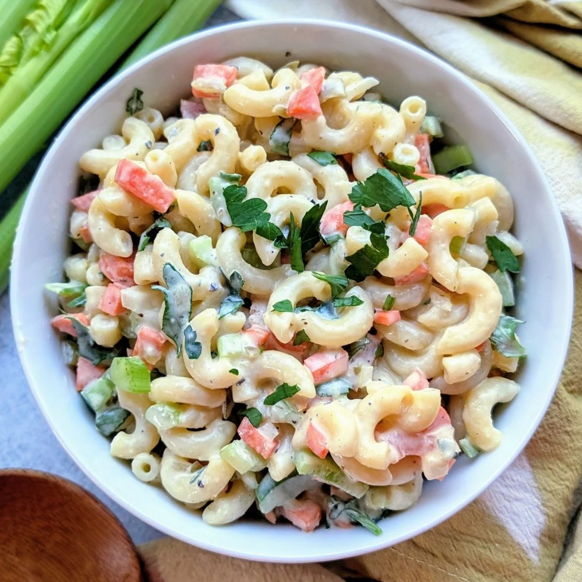 non dairy macaroni salad dairy free mac salad in a bowl with fresh vegetables