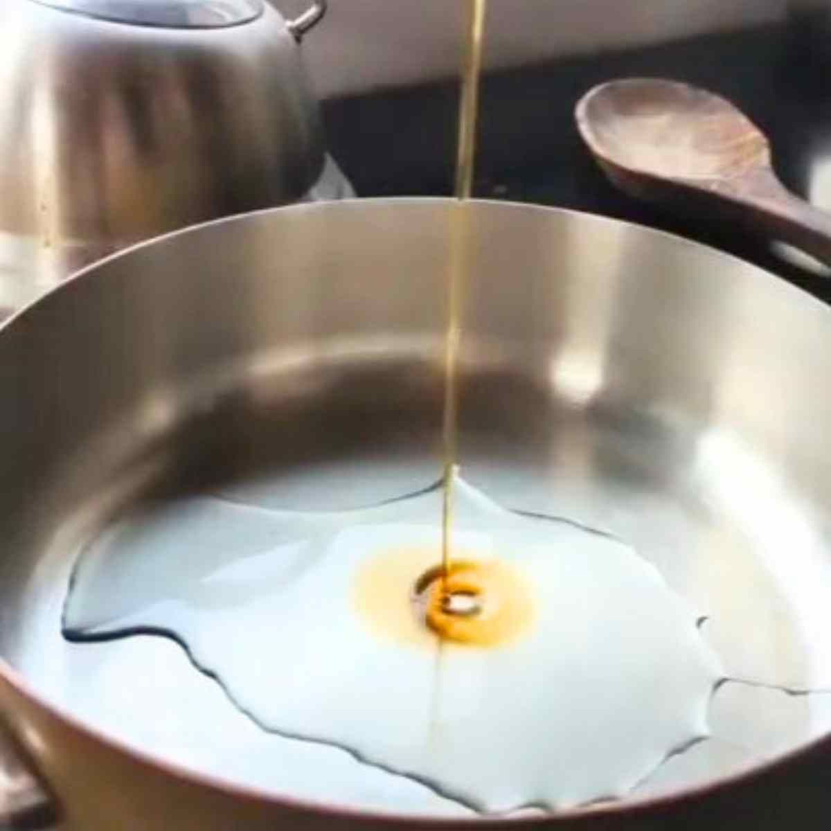 a pan with olive oil and toasted sesame oil to make kale noodles