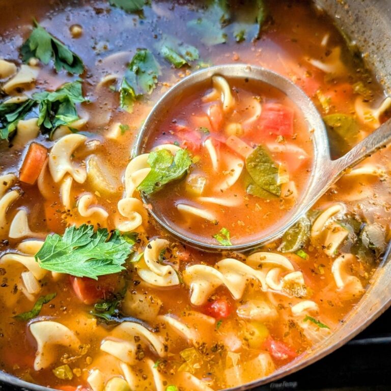 tomato vegetable noodle soup recipe with zucchini potatoes and hearty veggies that are high fiber and low sodium.