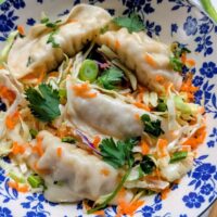 vegan pot sticker salad recipe gluten free gyoza salad with asian dumplings 15 minute filling salads for lunch or dinner plant based recipes with dumplings