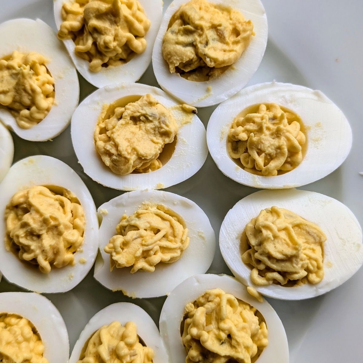 eff whites filled with deviled egg filling like yolks sweet pickle relish and mayonnaise