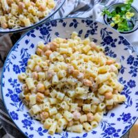 creamy parmesan cheese pasta with chickpeas or garbanzo beans and fresh grated cheese and olive oil
