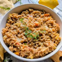 vegetable farro risotto recipe with cream, carrots, thyme, and spices
