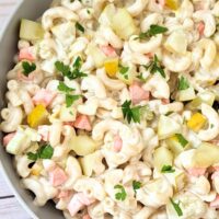creamy dill pickle macaroni salad recipe with carrots, onions, and a creamy dressing